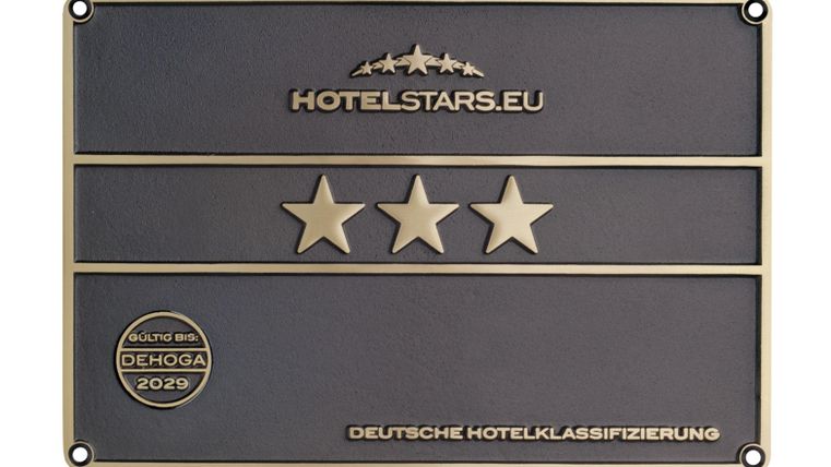 A sign for hotel classification with three stars. It bears the inscription "HOTELSTARS.EU" and "GERMAN HOTEL CLASSIFICATION".
