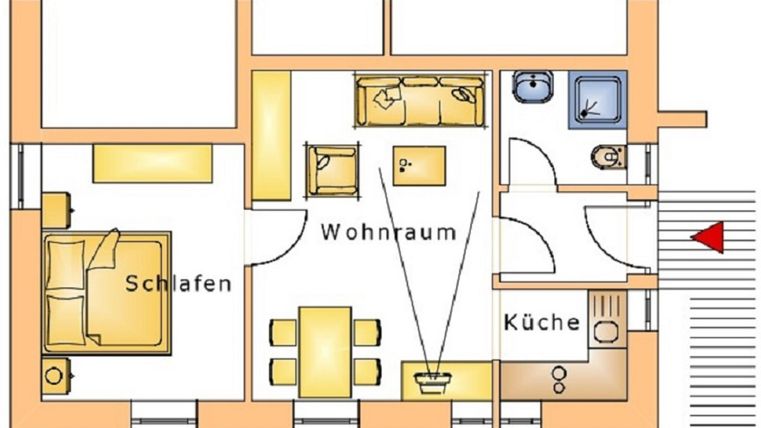 A simple floor plan drawing of an apartment with one bedroom, a living room, and a kitchen. The rooms are clearly arranged and labeled.